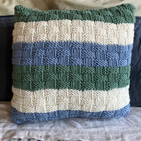 Brand-new hand-knitted cushion cover with feather cushion included