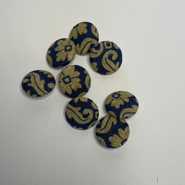 Set of 8 handmade covered buttons.
