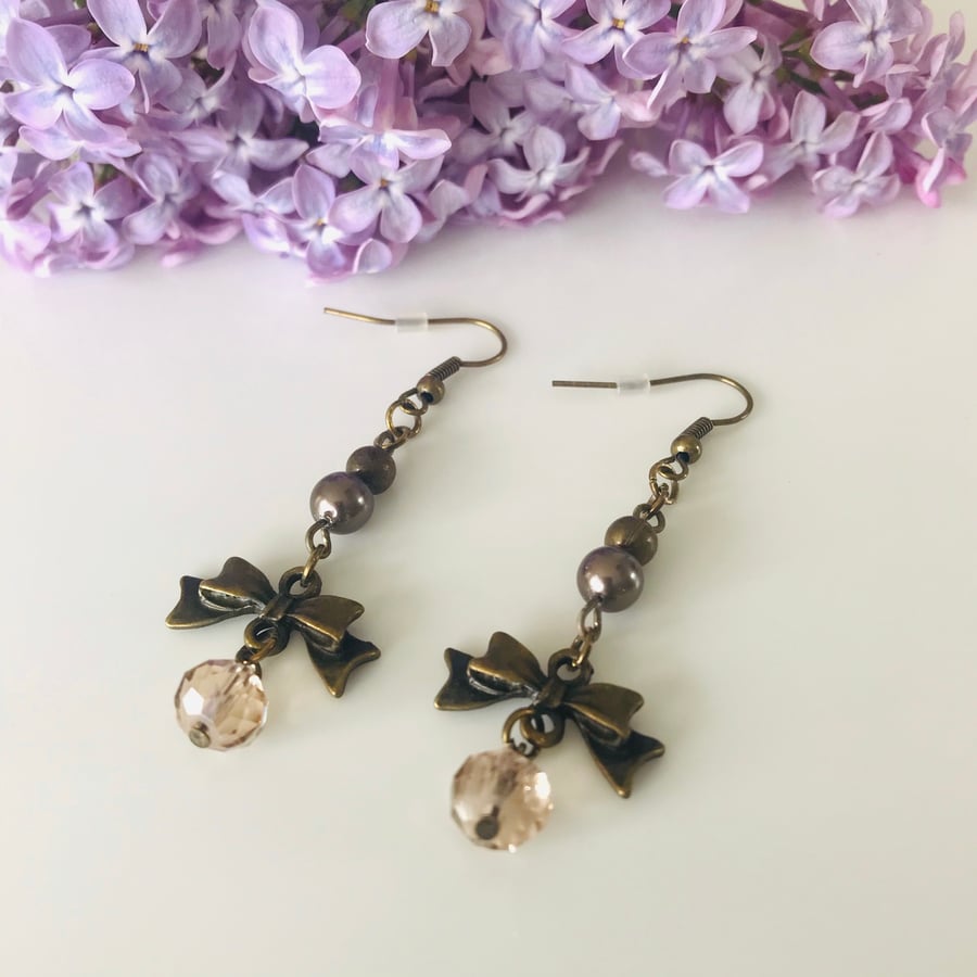 Bronze dangle bow earrings 