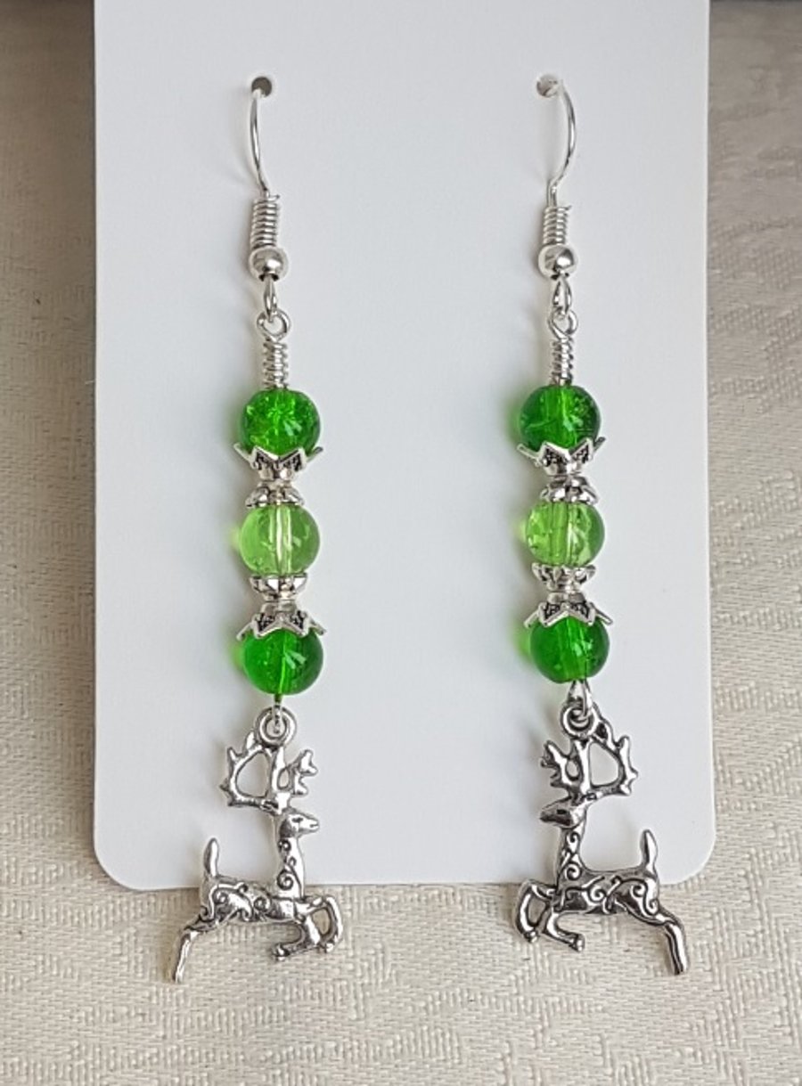 Festive Green Glass Earrings with Reindeer Charms.