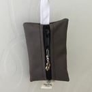 Grey dog bag carrier.