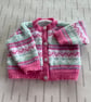 Fair Isle cardigan for a baby - Image 1