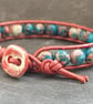 Red and blue rainbow jasper and leather bracelet with ceramic button fastener - Image 3