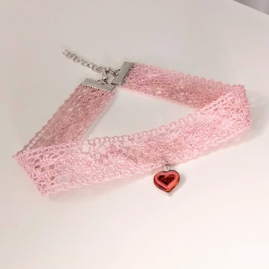 Vintage-style pink lace choker with glass heart