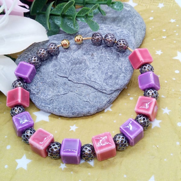 Pink and Lilac Ceramic Cube Beads and Gunmetal Spacer Beads on a Rigid Bangle