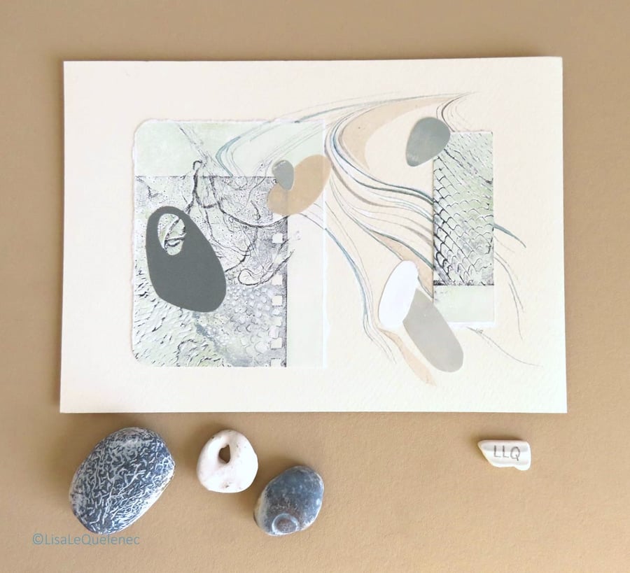 Mixed media collage of pebbles washed up by the tide subtle sage and cream tones