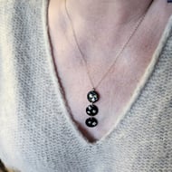 Three disk black enamel pendant 