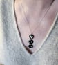 Three disk black enamel pendant  - Image 1