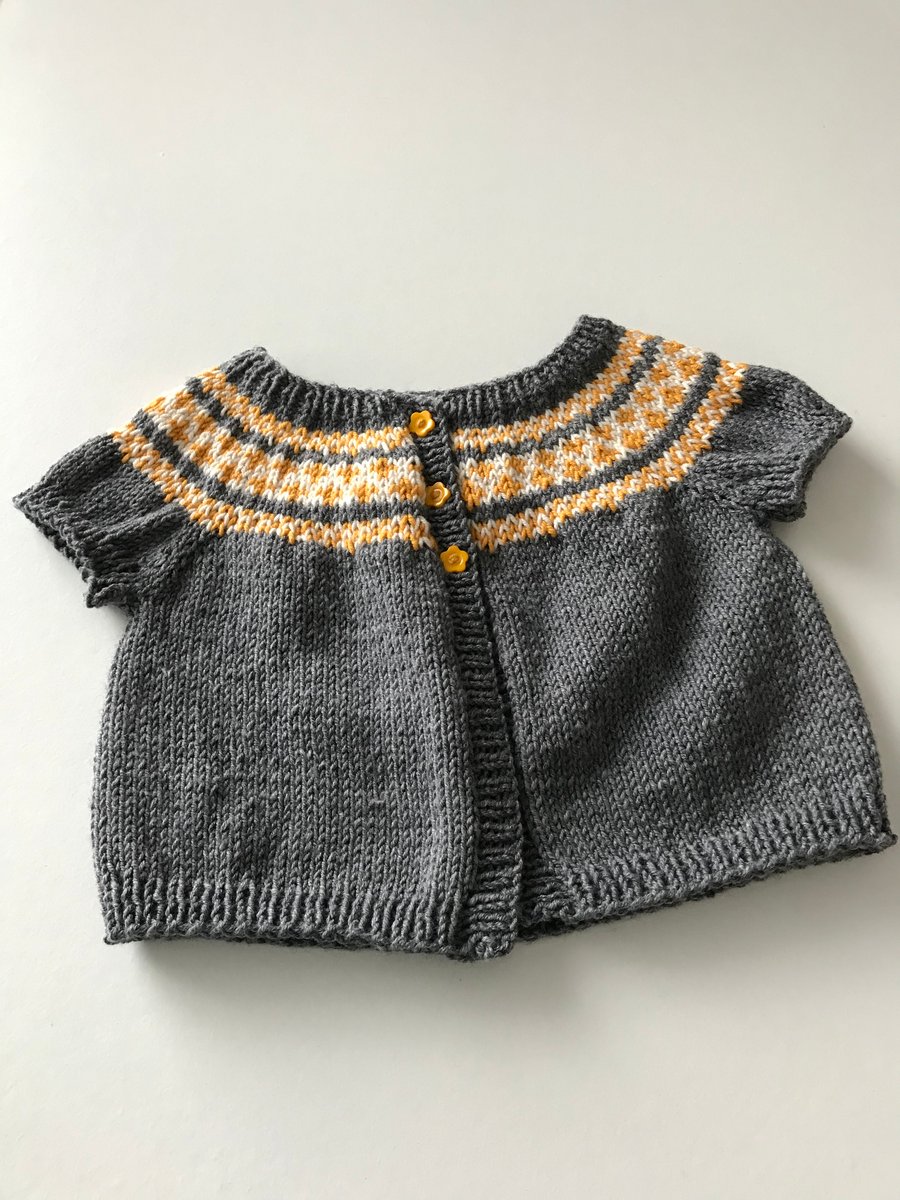 Short sleeved cardigan with a fair isle yoke