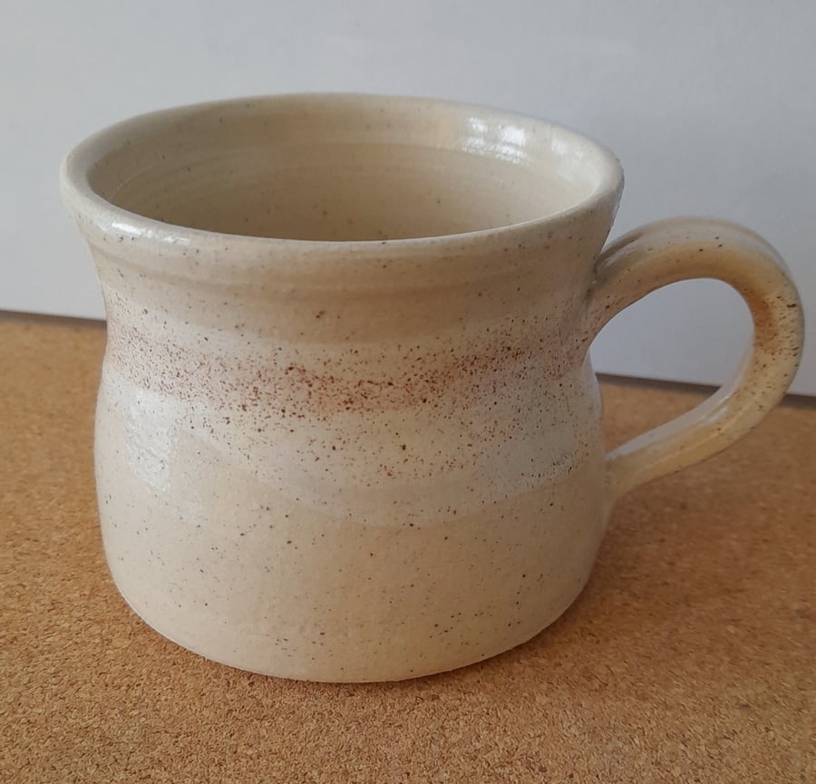Cream speckled coffee cup 