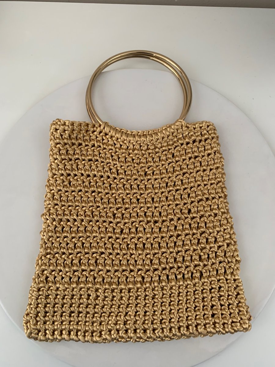 Crochet golden handbag