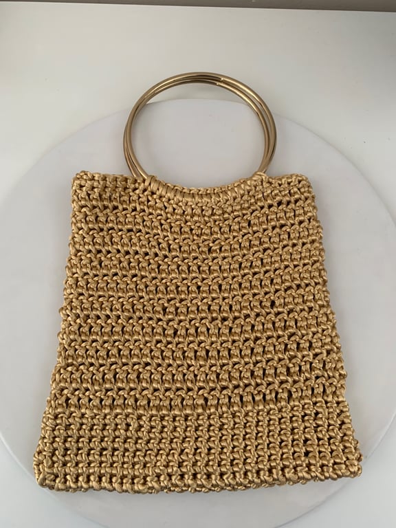 Crochet golden handbag