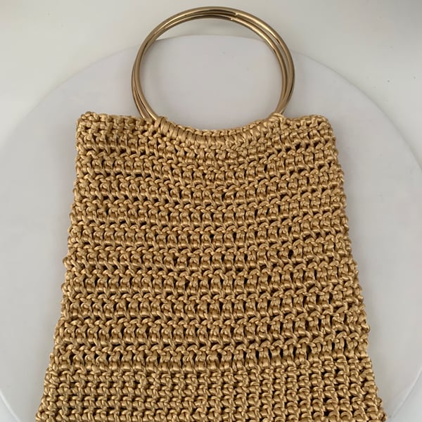 Crochet golden handbag