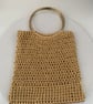 Crochet golden handbag