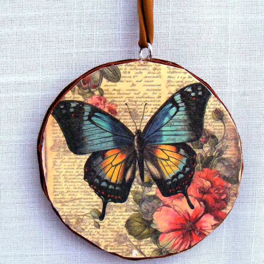 Butterflies decoupaged log slice wall decoration