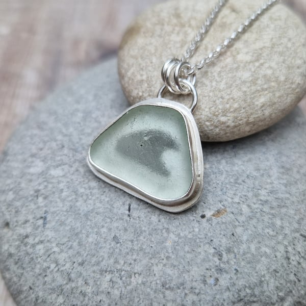 Sterling Silver Pale Green Sea Glass Pendant Necklace with Wave Cut Out