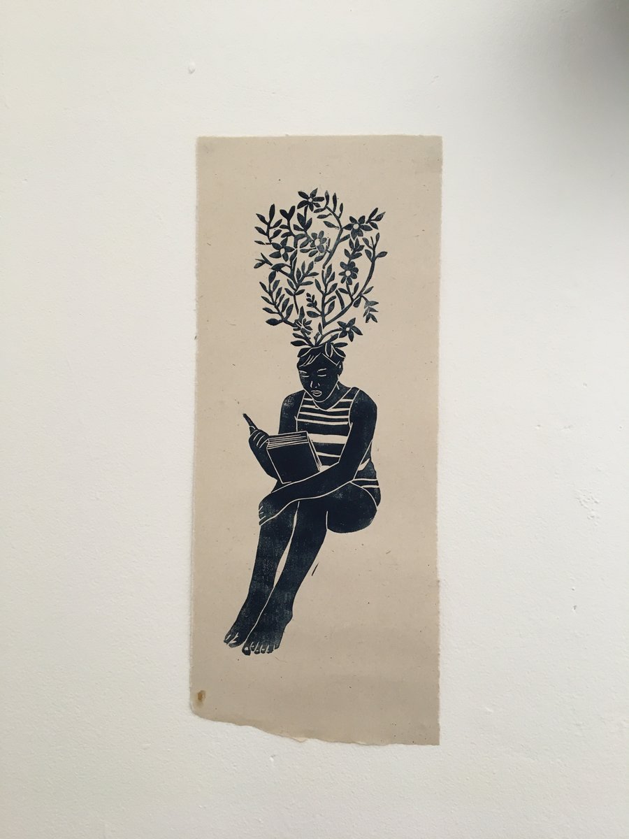 Limited edition linocut print of a reading girl on handmade paper, Philomath. 