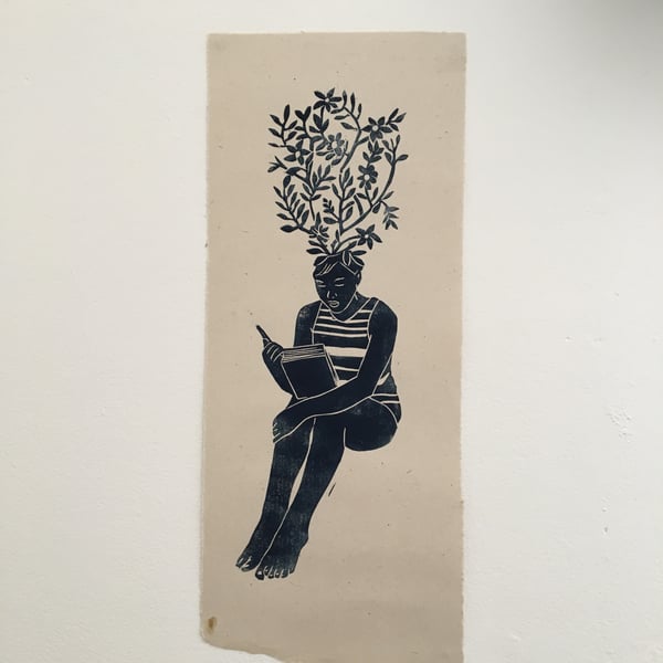 Limited edition linocut print of a reading girl on handmade paper, Philomath. 