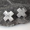 sterling silver kiss cross stud earrings