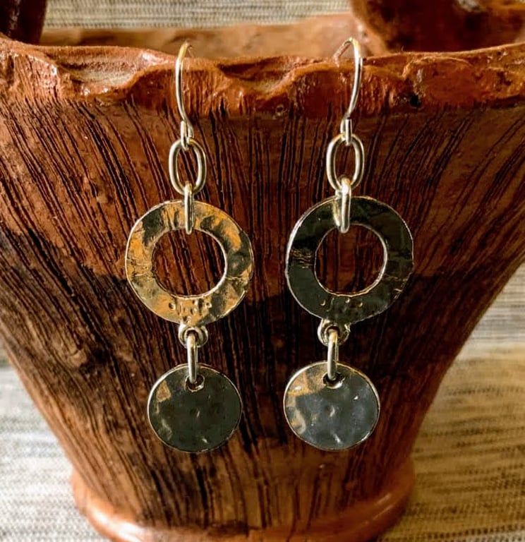    Perfectly Imperfect Circular hammered silver metal earrings.