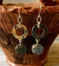     Perfectly Imperfect Circular hammered silver metal earrings. - Image 1