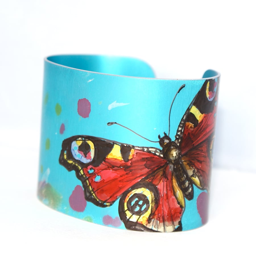 Peacock butterfly cuff