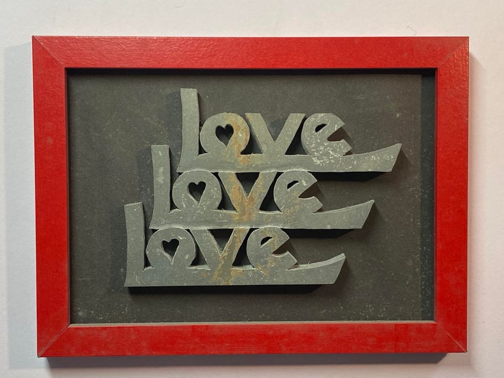 Love Love Love  or 'Lots of Love' hand cut stone in frame.