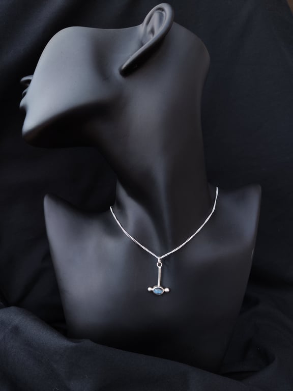 Silver pendant with labradorite