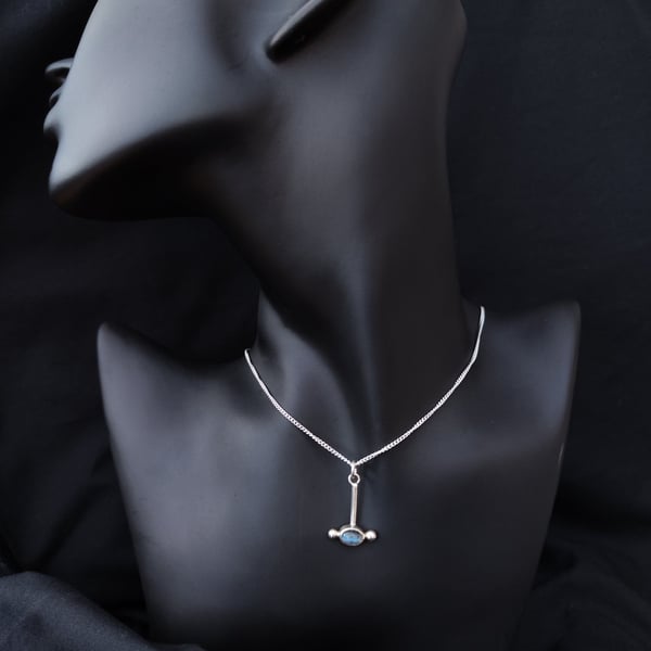 Silver pendant with labradorite