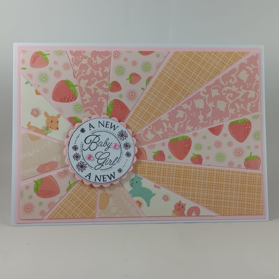 Handmade sunburst new baby girl card