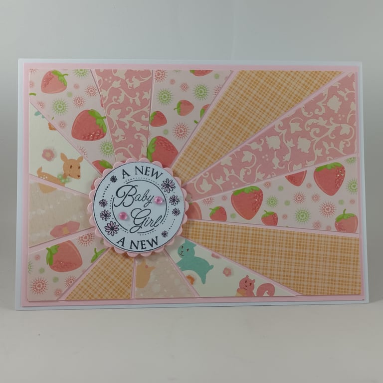Handmade sunburst new baby girl card