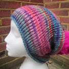 Slouchy multcoloured beanie hat with pom pom