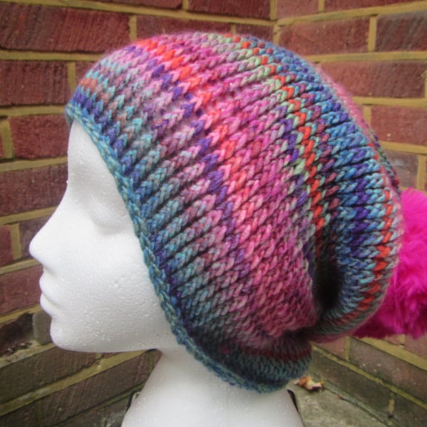 Slouchy multcoloured beanie hat with pom pom