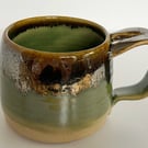 Green and iron pottery mug with ornate handle no.4