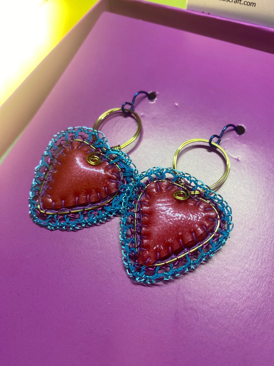 Red heart earrings from recycled materials