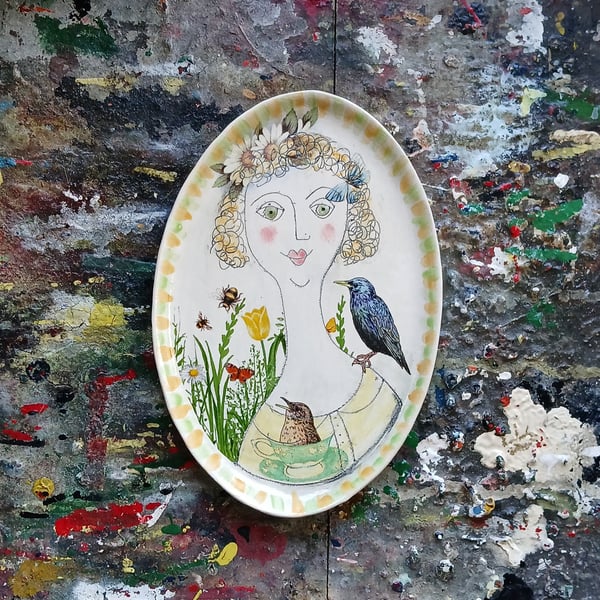 Figurative shallow dish-wall hanging 