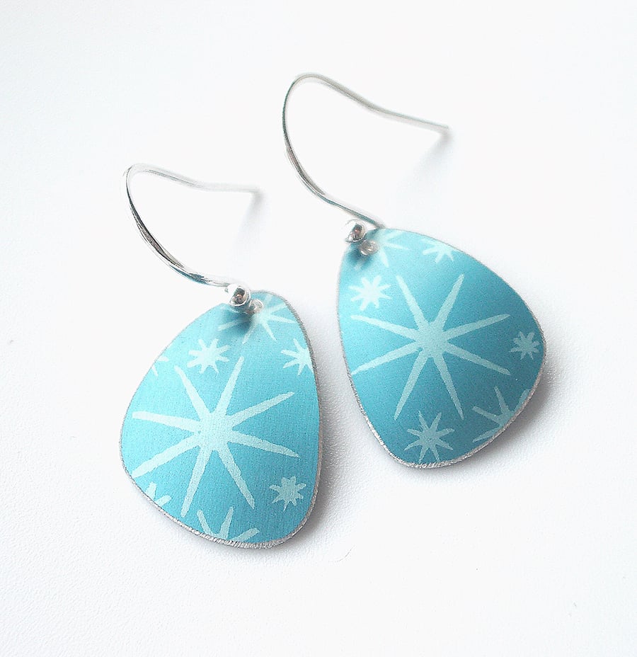 Tear drop shaped blue earrings with star print 