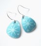Tear drop shaped blue earrings with star print  - Image 1