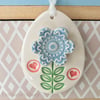 Pottery Easter Egg decoration with blue flower