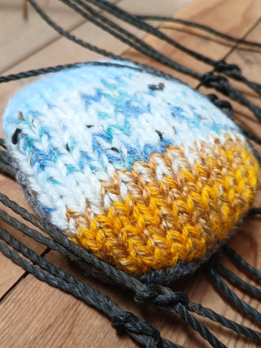 Handknitted Cornish Coastal Positivity Pebble.