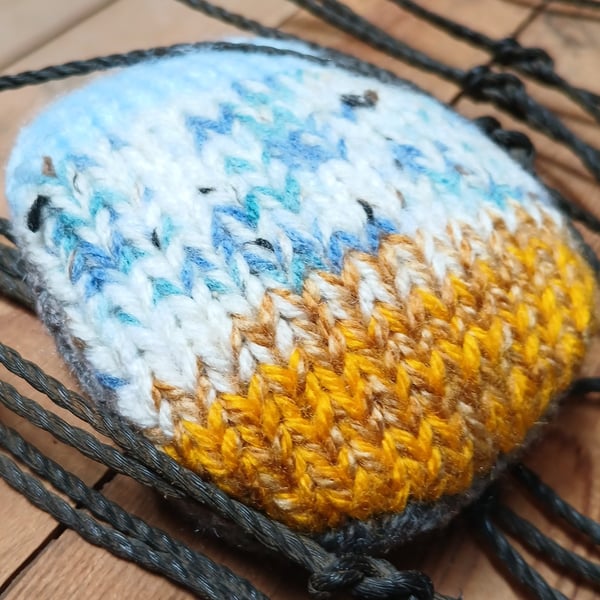 Handknitted Cornish Coastal Positivity Pebble.