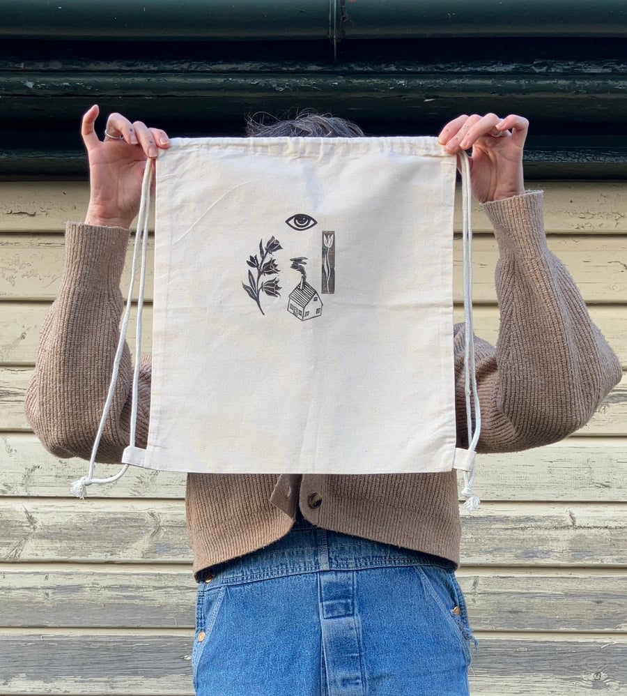 Witch's House linocut print drawstring backpack