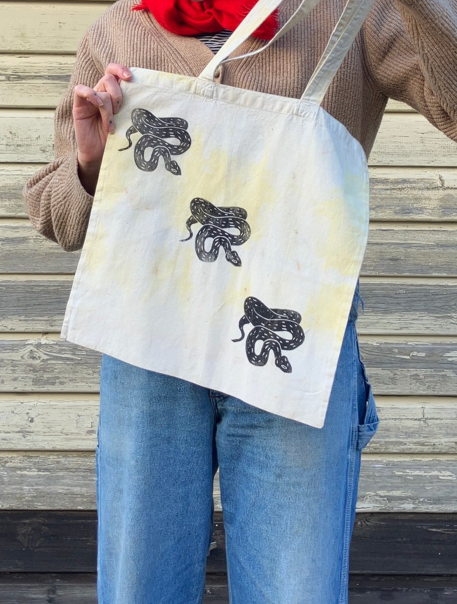 Adder print naturally dyed cotton tote bag