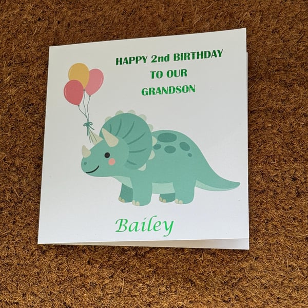 Dinosaur Birthday Card Foiled Message with Name & Age Dino with Balloons.