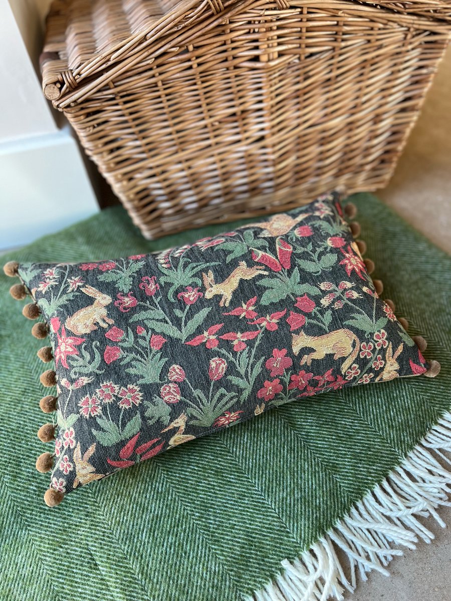 Reclaimed woodland tapestry fabric cushion cover with pompoms rabbits foxes