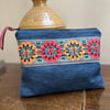 Reclaimed denim and braid zip pouch with liberty floral lining