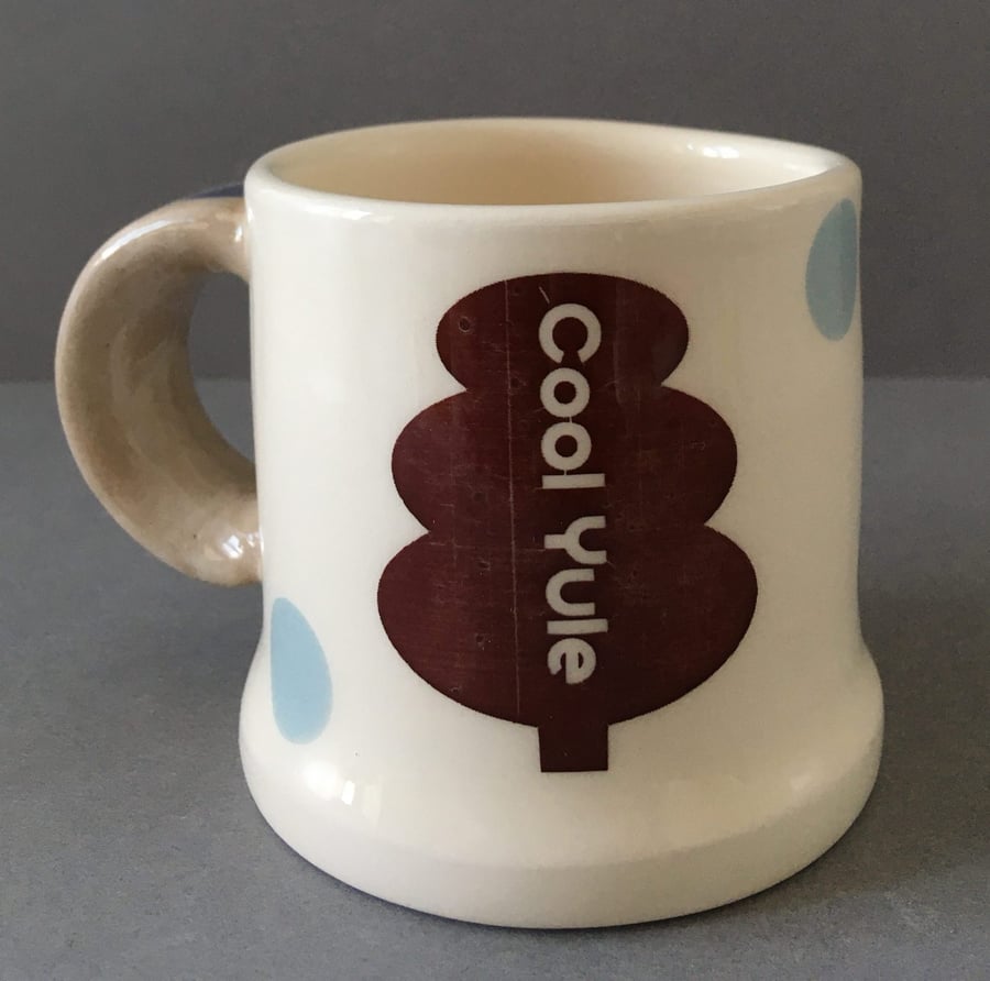 Spotty Cool Yule. Handmade ceramic mug.
