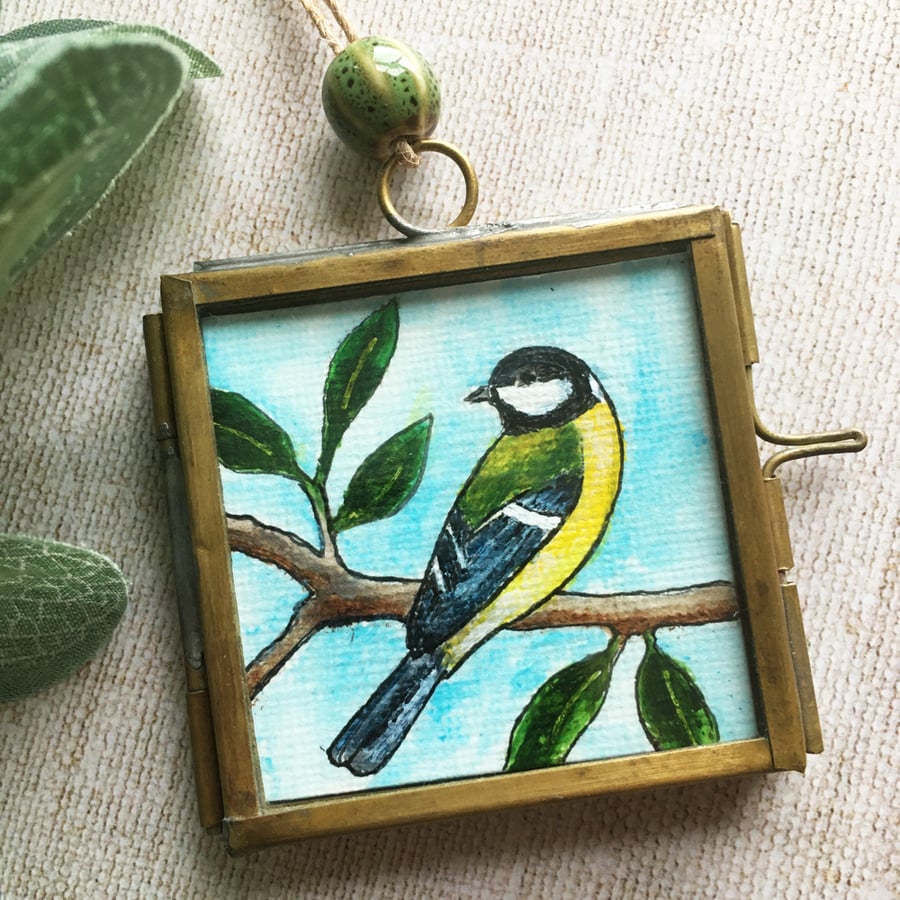 Tiny painting of great tit in hanging metal frame
