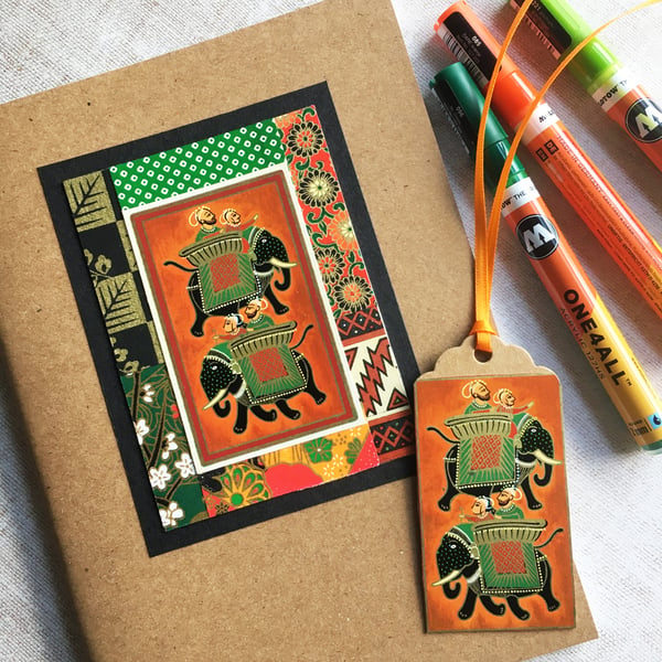Decorated A5 sketchbook or notebook. Indian elephants on orange.