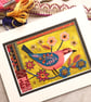 Handstitched picture of bird and flowers, textile art, fabric picture, hand sewn